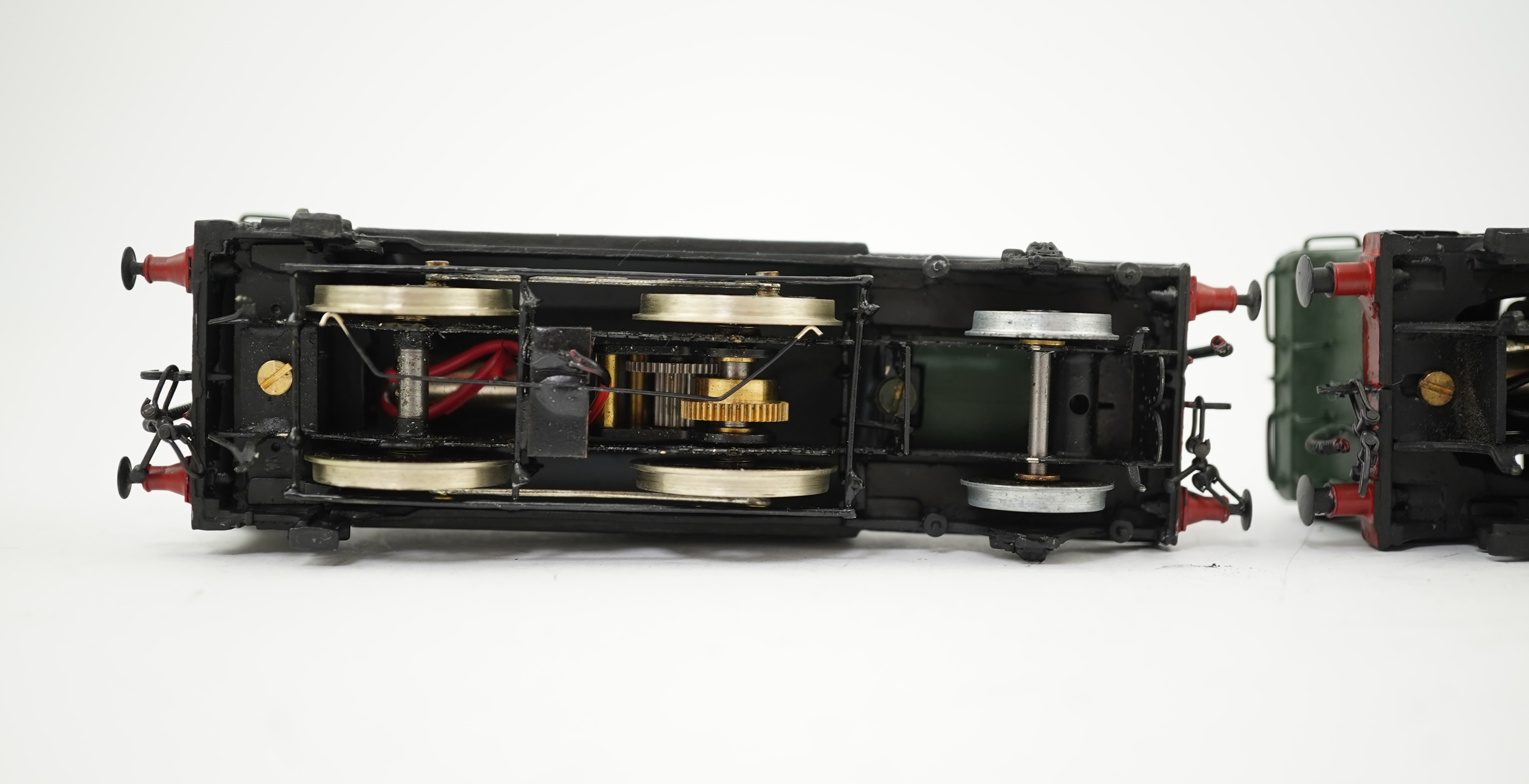 Two 00 gauge brass and white metal kit built GWR tank locomotives; a 1400 class 2-4-0T, 1458, together with an 1366 class 0-6-0PT, 1366, constructed, painted and lined to a high standard, both motored for two rail operat